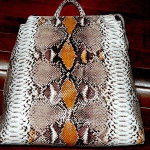 A New Day faux snake skin purse backpack